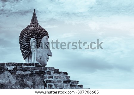 Picture from world heritage Ayutthaya site, Old Buddha sculpture at Wat Yai Chaimongkol temple Ayutthaya Thailand
