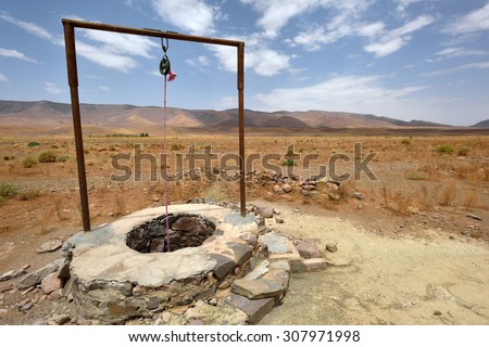 Water well in Sahara Desert, Morocco, North Africa Royalty-Free Stock Photo #307971998