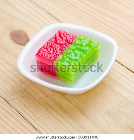 
Thailand Dessert : Khanom Chan is colorful layered dessert, popular and famous thailand dessert on white background