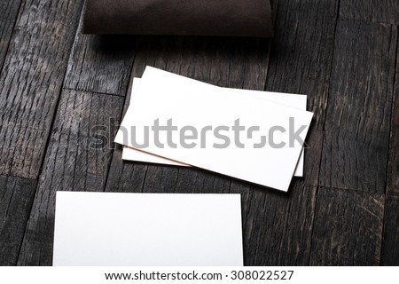 thick white cotton paper business card mock up with golden foil on the edges