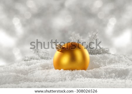 silver snow and golden ball 