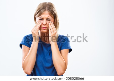 Woman is having pain in sinus.Sinusitis Royalty-Free Stock Photo #308028566
