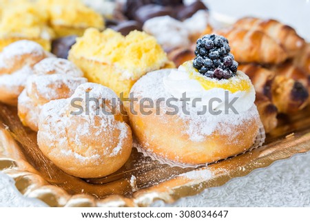 In the picture a tray of pastries typical Italian.