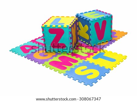Alphabet puzzle isolated on white background Royalty-Free Stock Photo #308067347