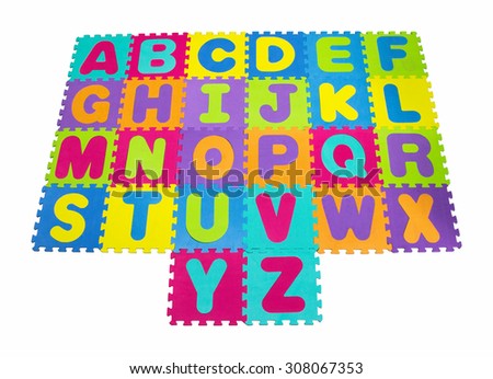 Alphabet puzzle isolated on white background Royalty-Free Stock Photo #308067353