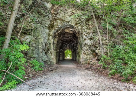 MKT tunnel on Katy Trail at Rocheport, Missouri. The Katy Trail is 237 mile bike trail stretching across most of the state of Missouri converted from an old railroad. Royalty-Free Stock Photo #308068445