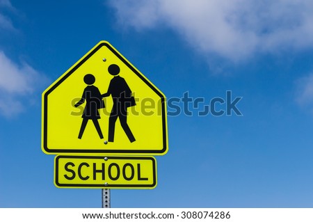 School Warning Sign with the sky background