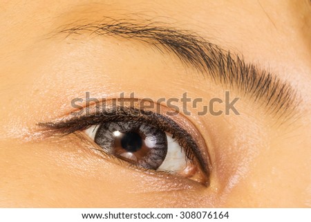 Eyelashes extension and gray colored contact lenses