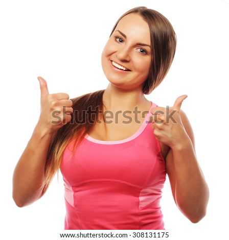 fitness woman in sport style standing against white background. 