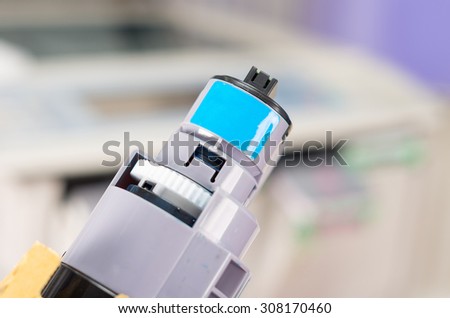 Photocopier printer blue cartridge close up shot