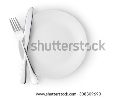 Fork and knife on a empty plate Royalty-Free Stock Photo #308309690