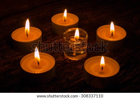 aromatherapy candles on the wooden background