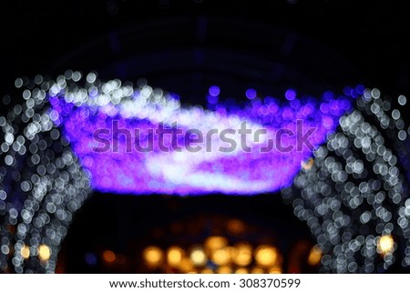 Abstract dark background with colorful bright bokeh