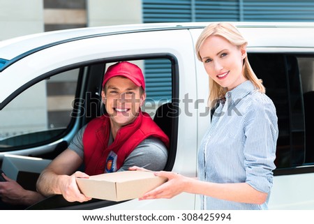 Courier Delivering Package By Van
