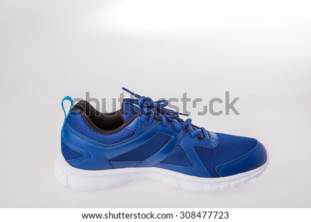 Running shoes on white background