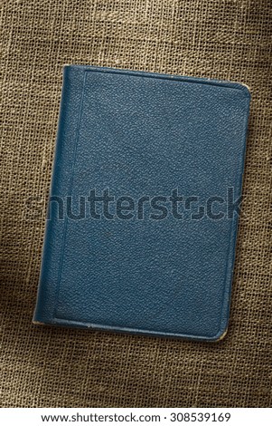 Dark blank blue notebook closed in closeup