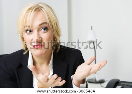 a business woman looking unsure or undecided