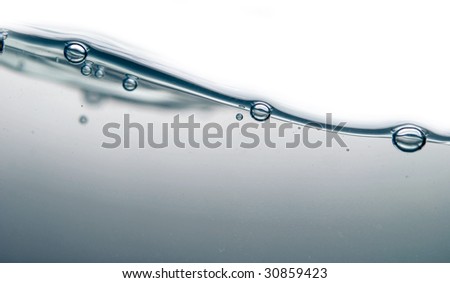 wave and bubbles over white background