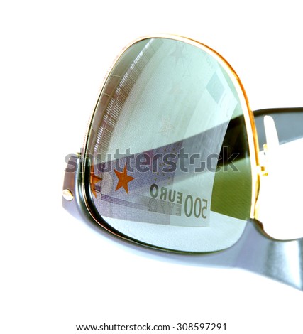five hundred euro reflected in sunglasses of greedy man eyes