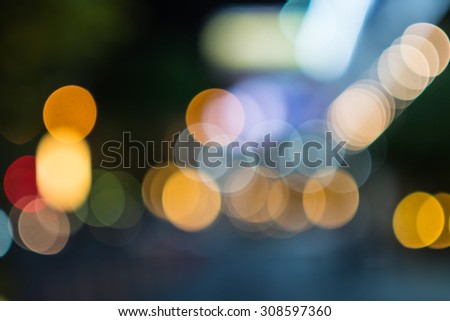 Abstract bokeh background of lights from cars in the city at night