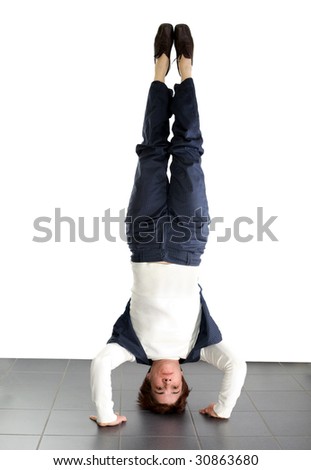 adult woman doing a headstand