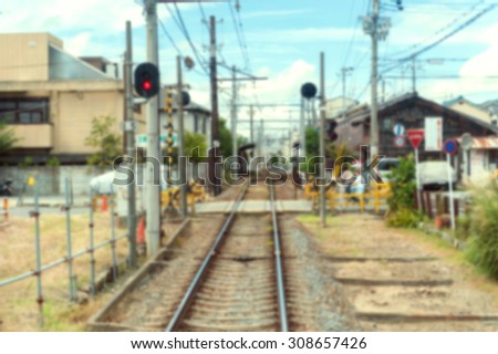 railway track blurred backgrond with perspective and gradient,grunge grainy vintage photo