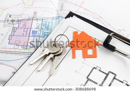 Model house, construction plan for house building, keys and clipboard. Real Estate Concept. Top view.