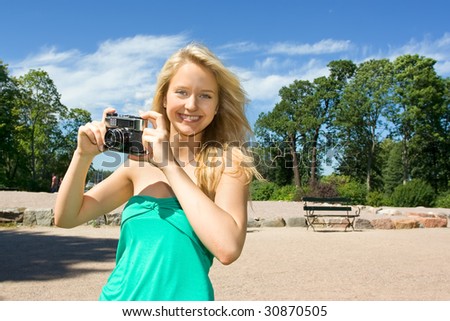 Pretty girl taking pictures