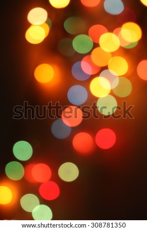 Defocused abstract background of colorful night lights