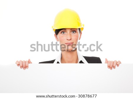 Construction business woman holding billboard