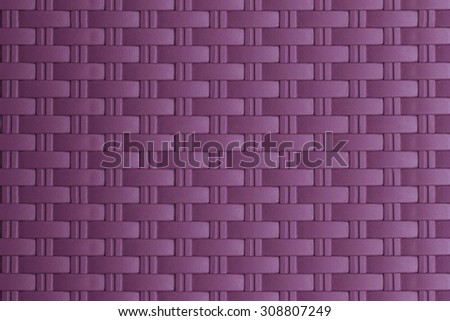Purple woven carbon fibre textured basket weaving
