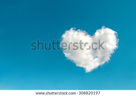 Cloud in the shape of a heart in the blue sky