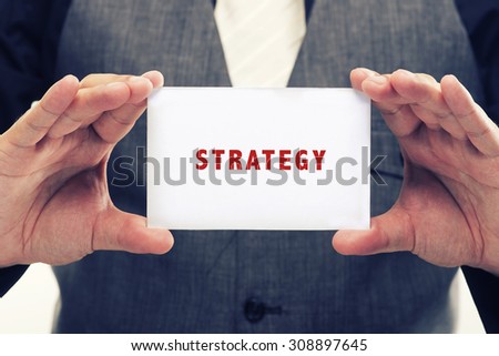 Executive Holding card with Message Saying-Strategy