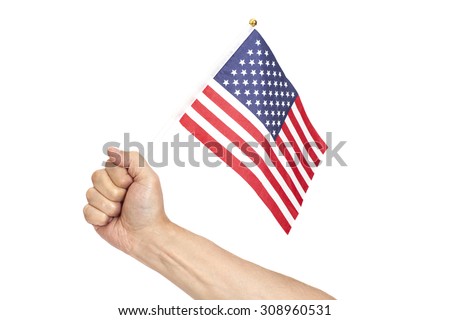 Hand holding American flag isolated on white background Royalty-Free Stock Photo #308960531