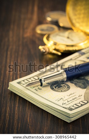 dollars money banknotes on wooden background
