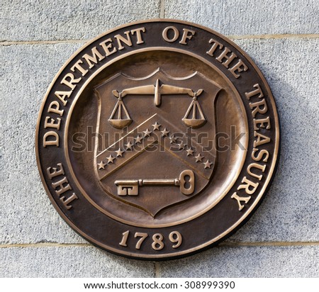 Present Bronze Seal Sign Symbol US Treasury Department adopted in 1968.  This seal has been used since 1968 until the present. Royalty-Free Stock Photo #308999390