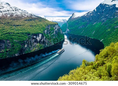Geiranger fjord, Beautiful Nature Norway. It is a 15-kilometre (9.3 mi) long branch off of the Sunnylvsfjorden, which is a branch off of the Storfjorden (Great Fjord). Royalty-Free Stock Photo #309014675