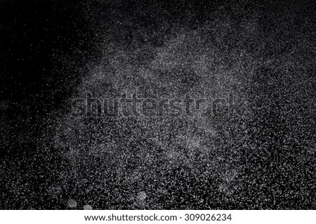 shower water drops,abstract splashes of water on a black background