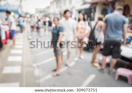 Abstract of blurred people walking on the street in phuket old town