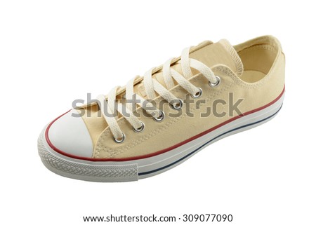 Cream canvas shoes on a white background 