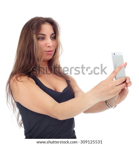 pretty young girl making selfie with the smartphone