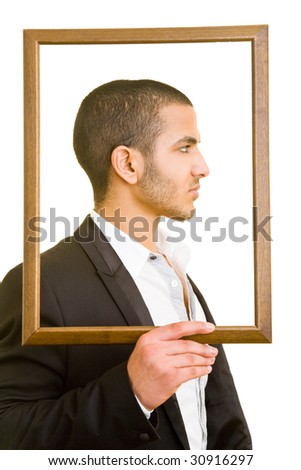 Business man holding an empty frame in front of his head