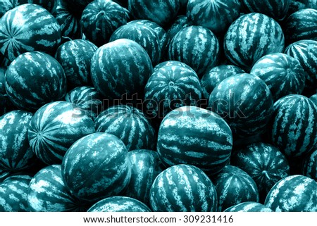 Screensaver from heap of blue watermelons