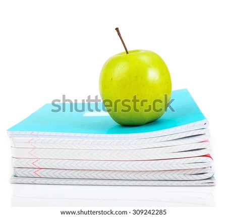 apple on writing-books. school concept 