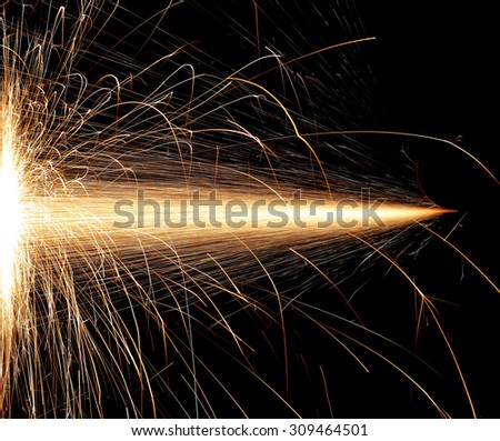 Sparks while cutting steel