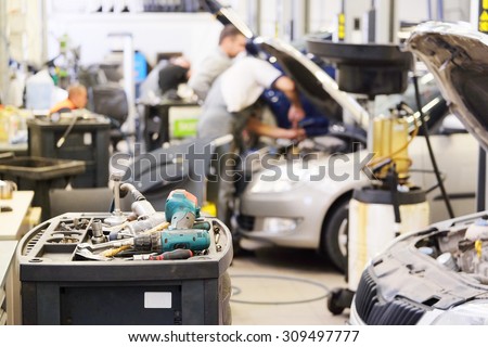 Interior of a car repair shop Royalty-Free Stock Photo #309497777
