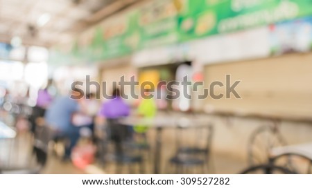 image of blur people at food center on day time for background usage .
