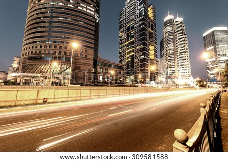 Urban city at night with traffic and night skyline