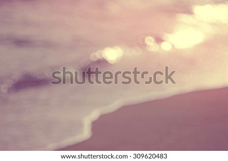 Blur bokeh wave beach abstract background.Retro color style.
