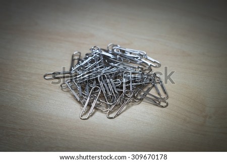 Silver Paper Clips with vignette background